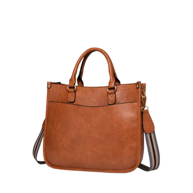 Modern Curved Twist Lock Asymmetrical Handbag - Image 2