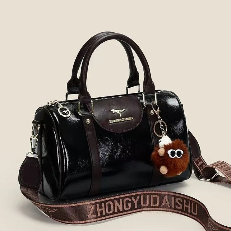 Women's Glossy Handbag with Playful Furry Pendant - Image 5